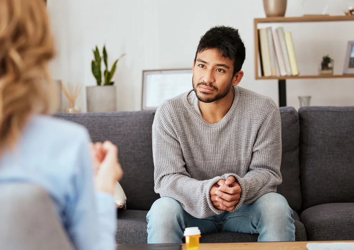 Man talking with a healthcare professional during a consultation